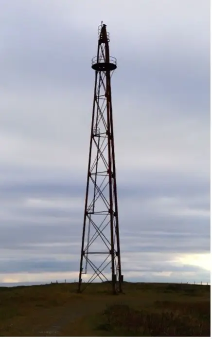 The 35-metre-high airship mast on Vadsøya against a cloudy sky
