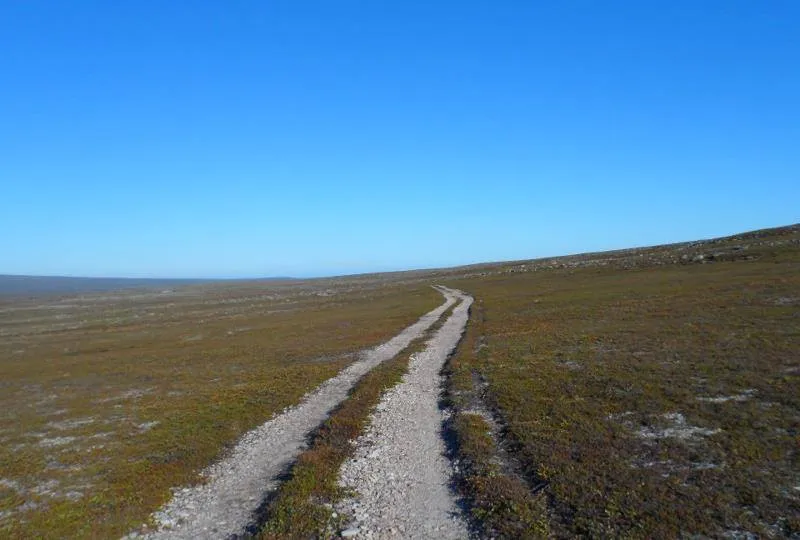 Hiking across the terrain of the Varanger Peninsula