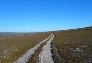 Hiking across the terrain of the Varanger Peninsula