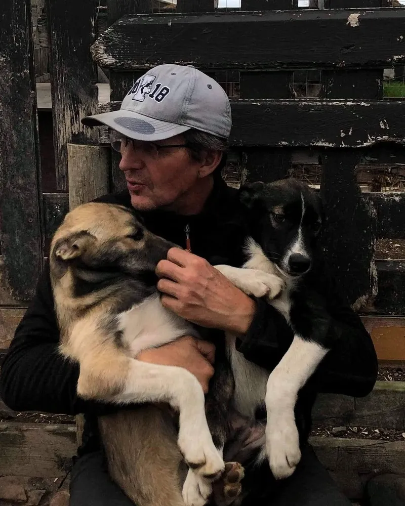 Vidar from Varanger Husky with two sled dog puppies